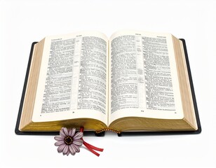 Obraz premium Open Bible with a Purple Flower and Red Ribbon on White Background.