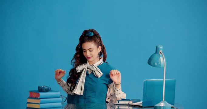 Stretching, relax and laptop with business woman for completed deadline, research article and done. Journalist reporter, books and finished report with person on blue background for satisfaction
