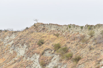 Fototapeta premium Mountain peaks landscape. High rocks mountains. Mountain landscape. Dark landscape. Rocks hills, Mountains view, mountain landscape, beautiful big mountain views in chakwal, Panjab, Pakistan