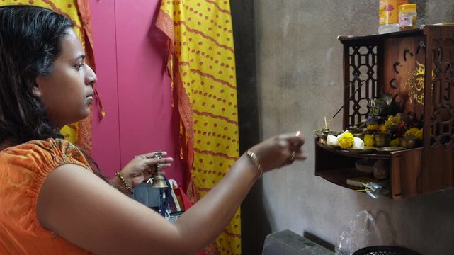 Woman Performing Daily Hindu Puja Worship Ritual Home Altar