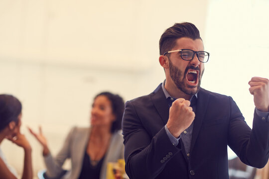 Office, celebration and business people with shout for excited, project and copywriting success. Publishing agency, management and team with fist pump for creative deal, winning and media article