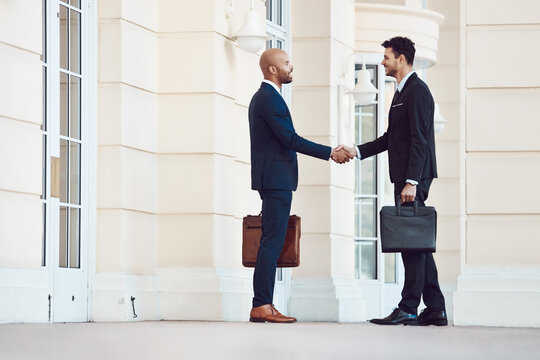 Business, people and lawyer with handshake in city for greeting, welcome and legal agreement. Men, attorney and shaking hands for introduction, client negotiation and partnership for case settlement
