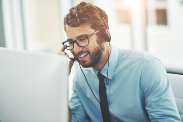 Computer, headset and happy man in call center for networking, customer support and sales pitch....