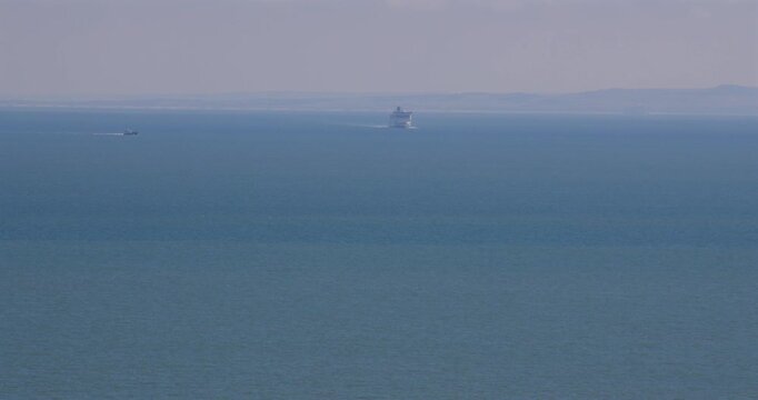 long Shot looking out over the English Channel with ferries and France in background.