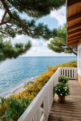 Fototapeta premium Balcony on coastal house overlooking blue ocean with pine trees