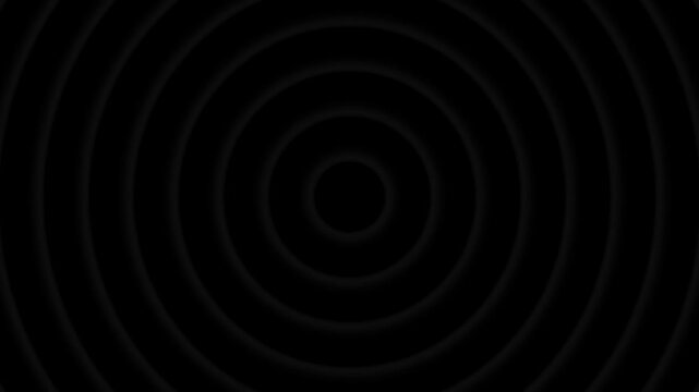 Soft concentric circle loop on a black background. Gray circles move gently like a kaleidoscope, expanding and repeating to create a calm and minimal visual. 4K Motion Graphics.
