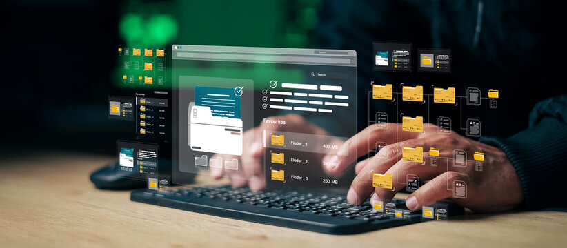 Digital file management system on computer showing folders, data organization, cloud storage and document workflow technology.
