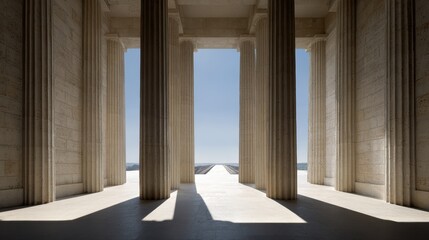 Fototapeta premium Architectural Columns: The interior of a majestic structure showcases classical architecture, featuring towering columns that frame a view of the clear, blue sky, bathed in soft light. 