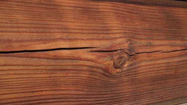 Wooden house, wooden wall close-up, wood texture. Wooden wall painted with oil paint.  