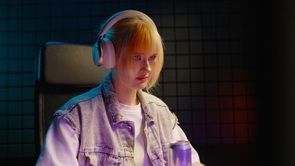 Young teen streamer gamer woman play fail online video game computer. Esport concept gaming virtual entertainment. E sport videogame tournament live stream. Female loser player girl loss competition. © Татьяна Епанешникова