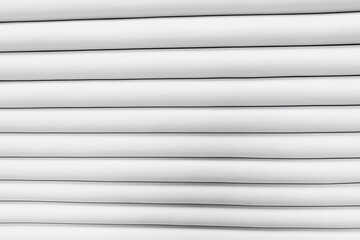 Obraz premium Clean fresh white fabric layers neatly stacked creating a soft minimalist abstract striped pattern background