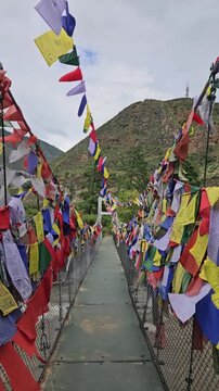Prayer Flags on Suspension Bridge