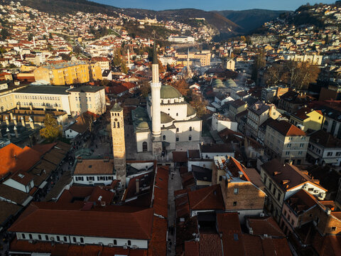Aerial view of Sarajevo Old Town Bascarsija with Sahat Kula clock tower and Gazi Husrev-beg Mosque at sunset, Bosnia and Herzegovina
