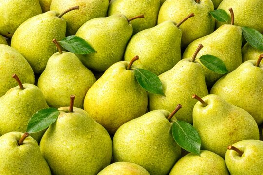 Fresh green pears flat lay macro texture top view.