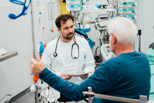 Doctor consulting with a patient in an emergency room setting