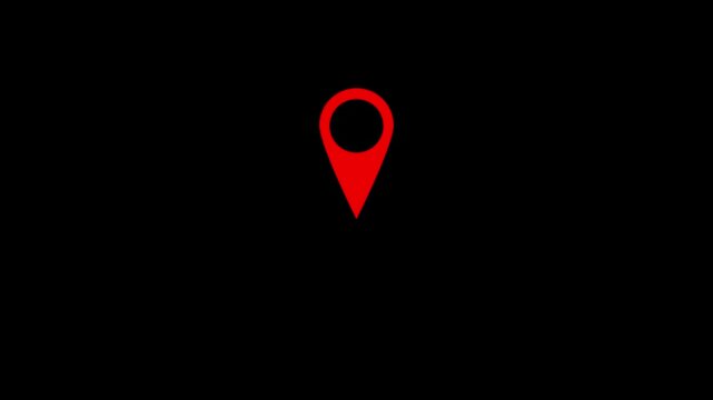 A stark minimalist composition features a vibrant red location pin icon centered against a completely black background emphasizing isolation high quality professional