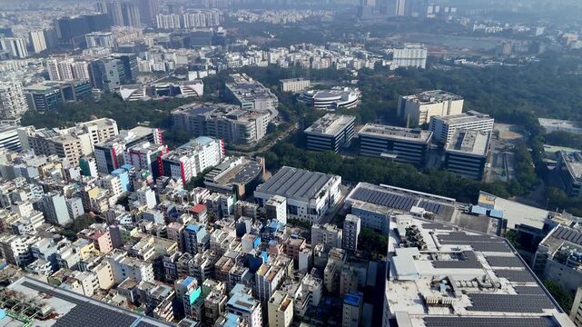 Aerial captures modern infrastructure driven by renewable solar power. A grid of solar panels crowns the complex, showcasing sustainable design in Hyderabad&rsquo;s evolving skyline.