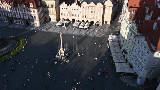  City Center Life and Architecture in Prague, Czech Republic. The footage captures iconic landmarks, red trams, and and the beautiful Gothic and Baroque architecture of the old town
