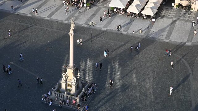  City Center Life and Architecture in Prague, Czech Republic. The footage captures iconic landmarks, red trams, and and the beautiful Gothic and Baroque architecture of the old town