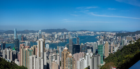 Fototapeta premium Panoramic view of Hong Kong Skyline. Hong Kong city building and sea view from the top of the mountain.