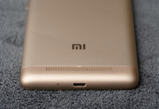 Dnipro, Ukraine 03.11.2025: Xiaomi Redmi 3S. A classic smartphone with a touchscreen and physical home button. Ideal for app mockups, mobile tech concepts, and vintage electronic themes.	