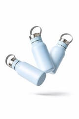 Light blue reusable water bottle spinning with stroboscopic flash showing three positions in one frame