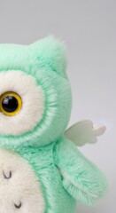 Fototapeta premium Cute Teal Owl Stuffed Animal Toy.