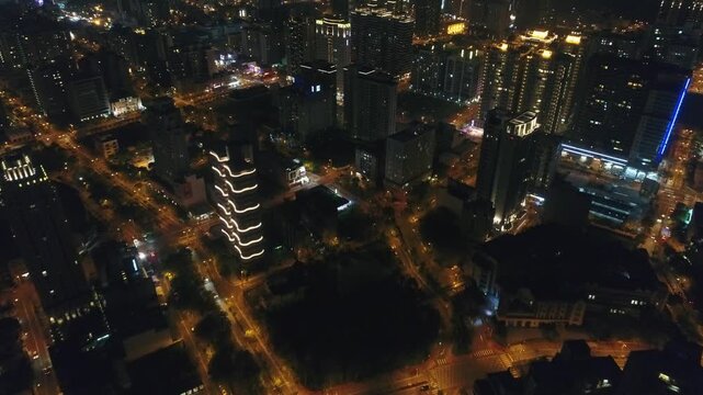 Aerial Shot of Zhubei City Skyline at Night - Cityscape birds eye view use the drone, shot in Hsinchu, Taiwan.
