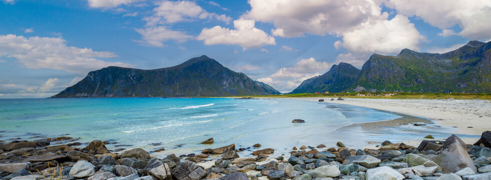 Rocky seashore. Beach with white sand. Beautiful nature of Norway. Lofoten islands. Ramberg