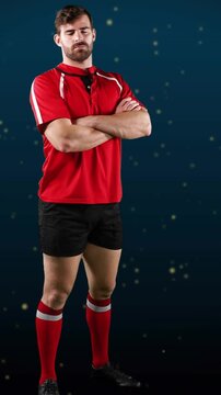 Vertical video: Player posing cross-armed, camera moving causing weight or torso or head shifts for 