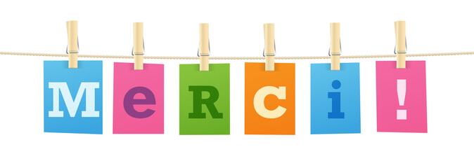 MERCI! typography with colorful letters pinned to string with pegs