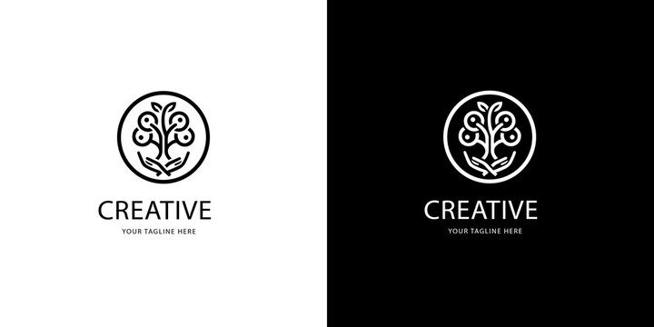 Sustainable tree logo icon held by human hands for ecology and growth concept