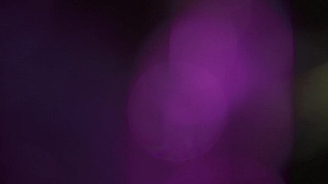light leak and bokeh overlay with purple and green hues, perfect for adding a cinematic effect or artistic flair to your projects.