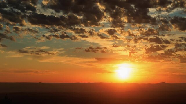 Inspirational Sunset with Sun and Clouds Zoom In Timelapse