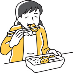 お弁当を食べる女性