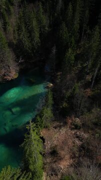 Blausee Blue Lake small picturesque in the Bernese Oberland region of Switzerland