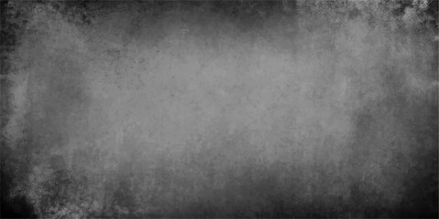 Obraz premium An aged dark grey grunge metal and paper texture background with a vintage rough concrete stone surface pattern for a blank dirty wallpaper design