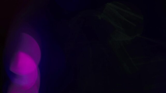 Light leak and bokeh overlay with purple and pink hues, creating a dreamy, ethereal effect. Ideal for adding a touch of magic to videos.