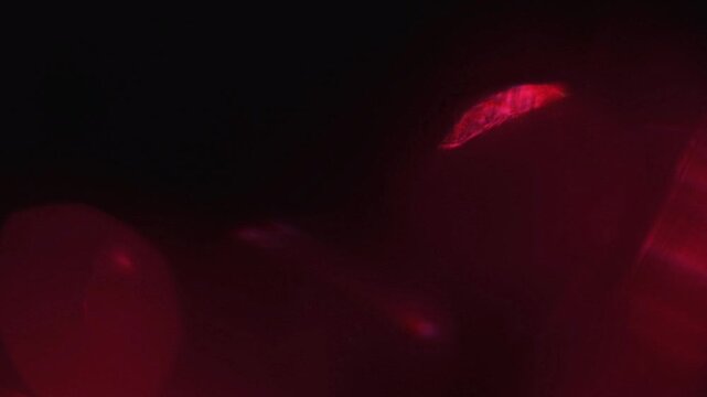 light leak and bokeh overlay with red tones, perfect for adding cinematic effects or transitions to your footage.