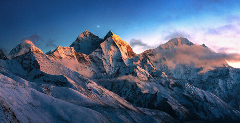 Panoramic view Himalaya mountain range sunset with first stars appearing in twilight sky, captured from Kala Patthar during Everest Base Camp trek, Nepal