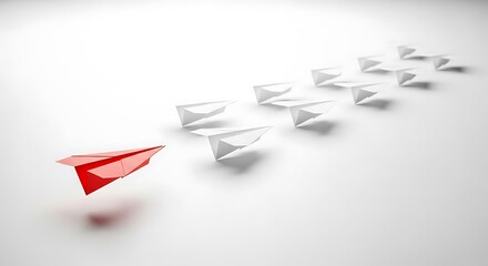 A red paper airplane leading a line of white paper airplanes on a white background isolated on white background