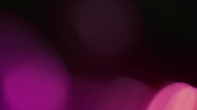 light leak and bokeh overlay with purple and pink hues, perfect for adding an artistic touch or transition effect to your footage.