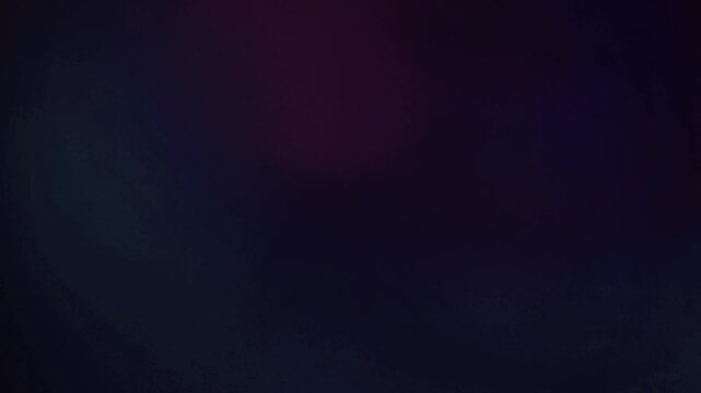Light leak and bokeh overlay with deep purple and blue hues, creating a moody, atmospheric effect. Perfect for adding texture and emotion to video projects.