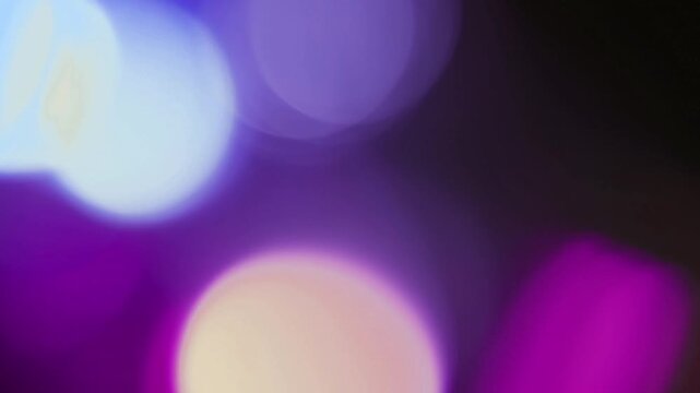 light leak and bokeh overlay with purple and blue tones, perfect for adding a dreamy, ethereal quality to your projects.