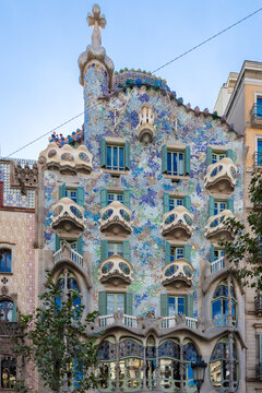 Barcelona, Spain 10-05-2025 A view on the spectacular facade of the Casa Batllo in the centre of Barcelona, which is a design by Gaudi and it is unique with it's natural shapes and colourful mosaic or