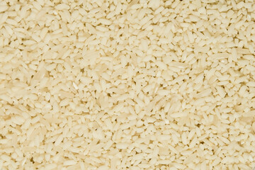Abstract pattern and texture background of crushed white rice pile surface. For graphic design, 3D rendering and banners