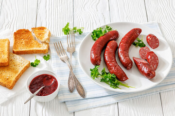 Smoked isterband sausages on a plate