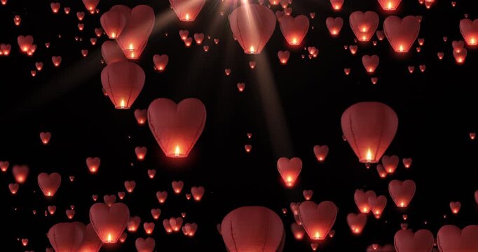 Animation of sky heart lanterns rising into the night sky, symbolizing love, romance, wedding celebration, hope, and Valentine&rsquo;s Day atmosphere.