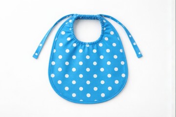 Blue baby bib with white polka dots and tie straps isolated on white
