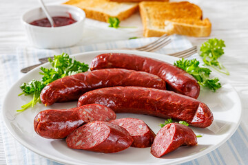 Smoked isterband sausages on a plate